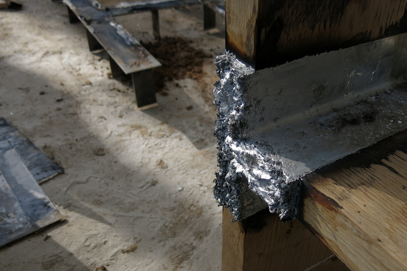 Illustration for article titled Casting Molten Metal On Wood With a Hungarian Design Master